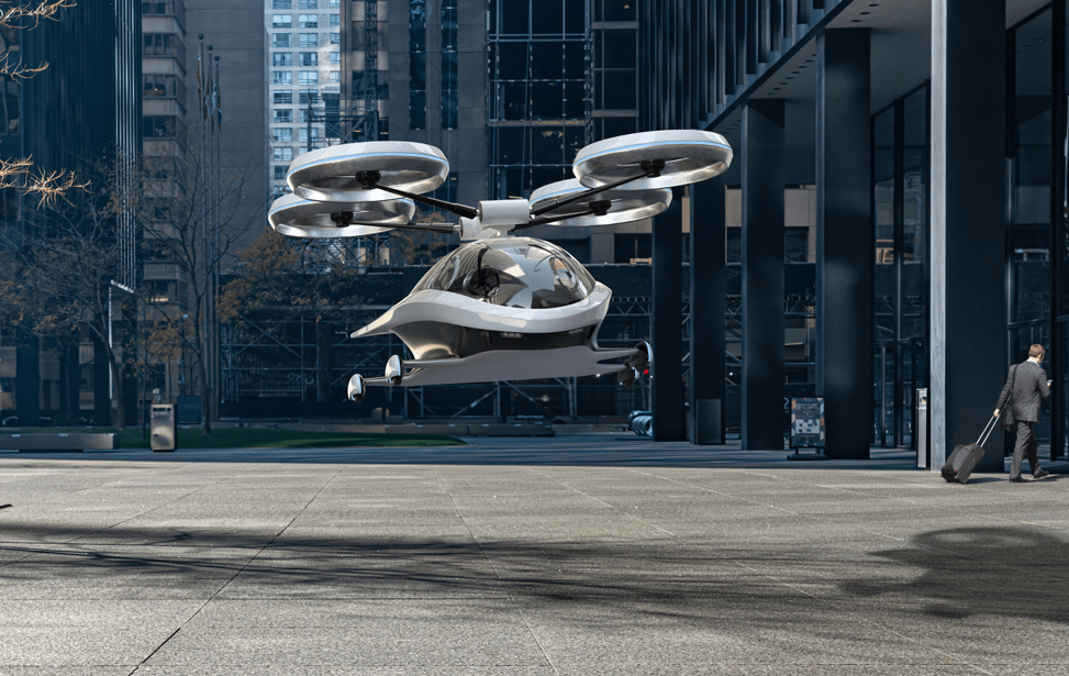 eVTOL Hovering above sidewalk in a city